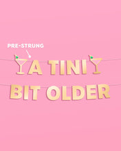 Load image into Gallery viewer, Tini Bit Older Banner
